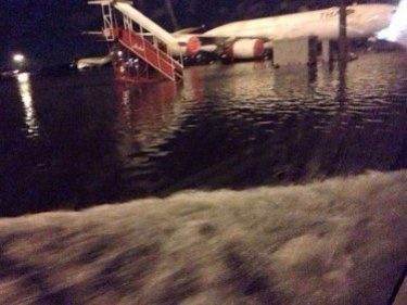 Floods Lap at Don Muang as Early Storms Slow Bangkok