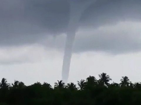 Waterspouts hover offshore south of Phuket (Video)