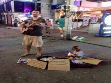 Phuket Tourist Turns Busker in Patong to Pay Daughter's Hospital Bills